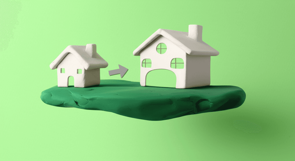 A modern, clean graphic illustrating the concept of land-to-asset ratio with a house icon on a large plot of land versus a large house on a small plot